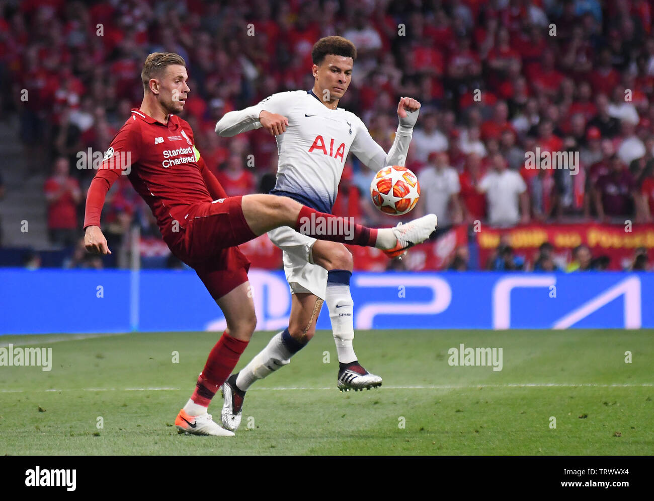 MADRID, SPAIN - JUNE 1, 2019: Jordan Henderson of Liverpool (L) and Dele Alli of Tottenham pictured during the 2018/19 UEFA Champions League Final between Tottenham Hotspur (England) and Liverpool FC (England) at Wanda Metropolitano. Stock Photo