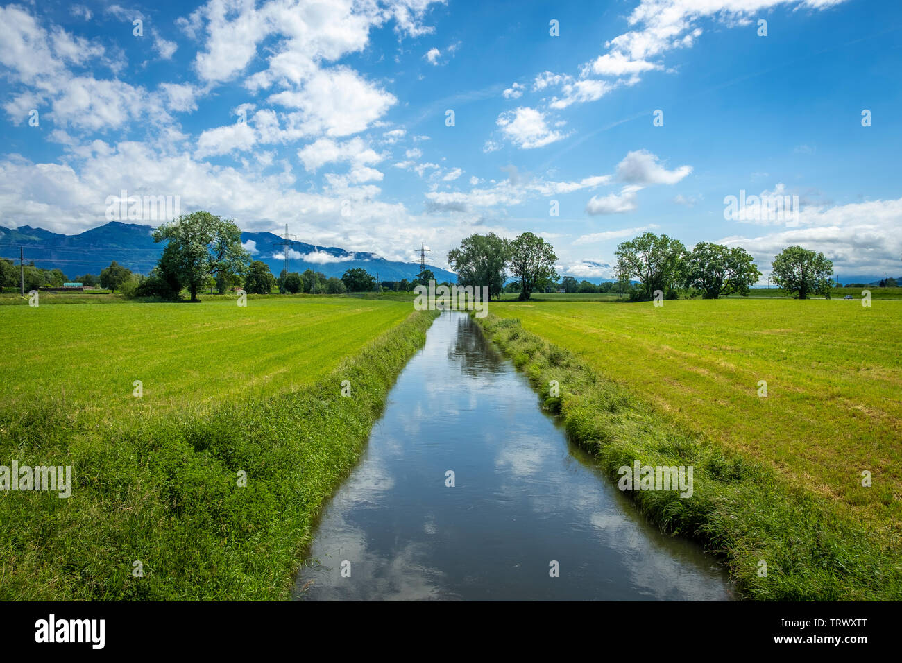 Spiegelungen am Lustenauer Kanal, Vorarlberg, Austria Stock Photo