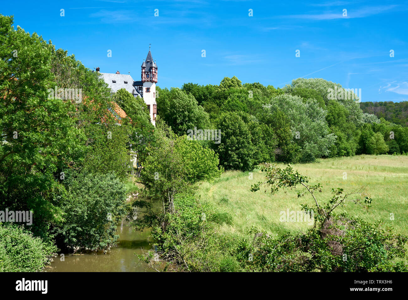 Nidder The fairytale new castle of Büdesheim on the river Nidder in Germany ...