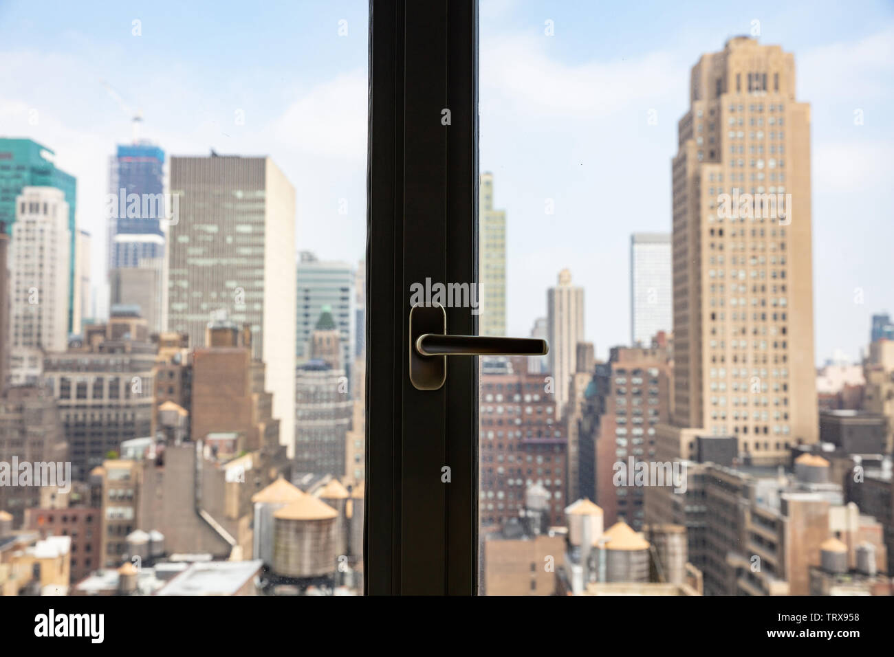 New York City Skyline Out Of A Window View Of Manhattan Skyscrapers Cloudy Sky Background Stock Photo Alamy