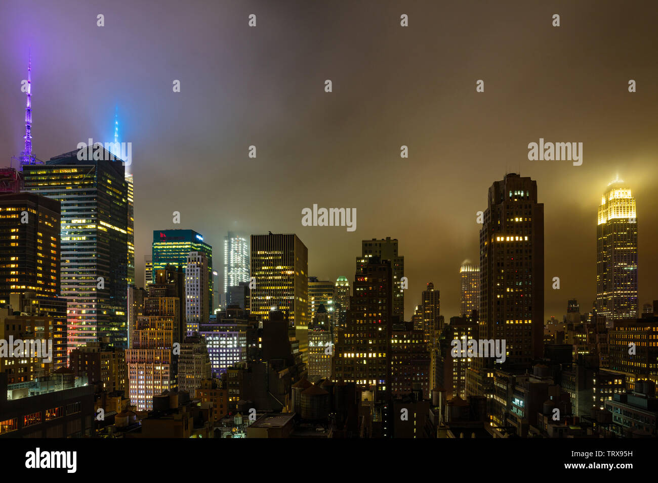 New York city skyline at night. Aerial view of Manhattan skyscrapers and Empire state building, illuminated Stock Photo