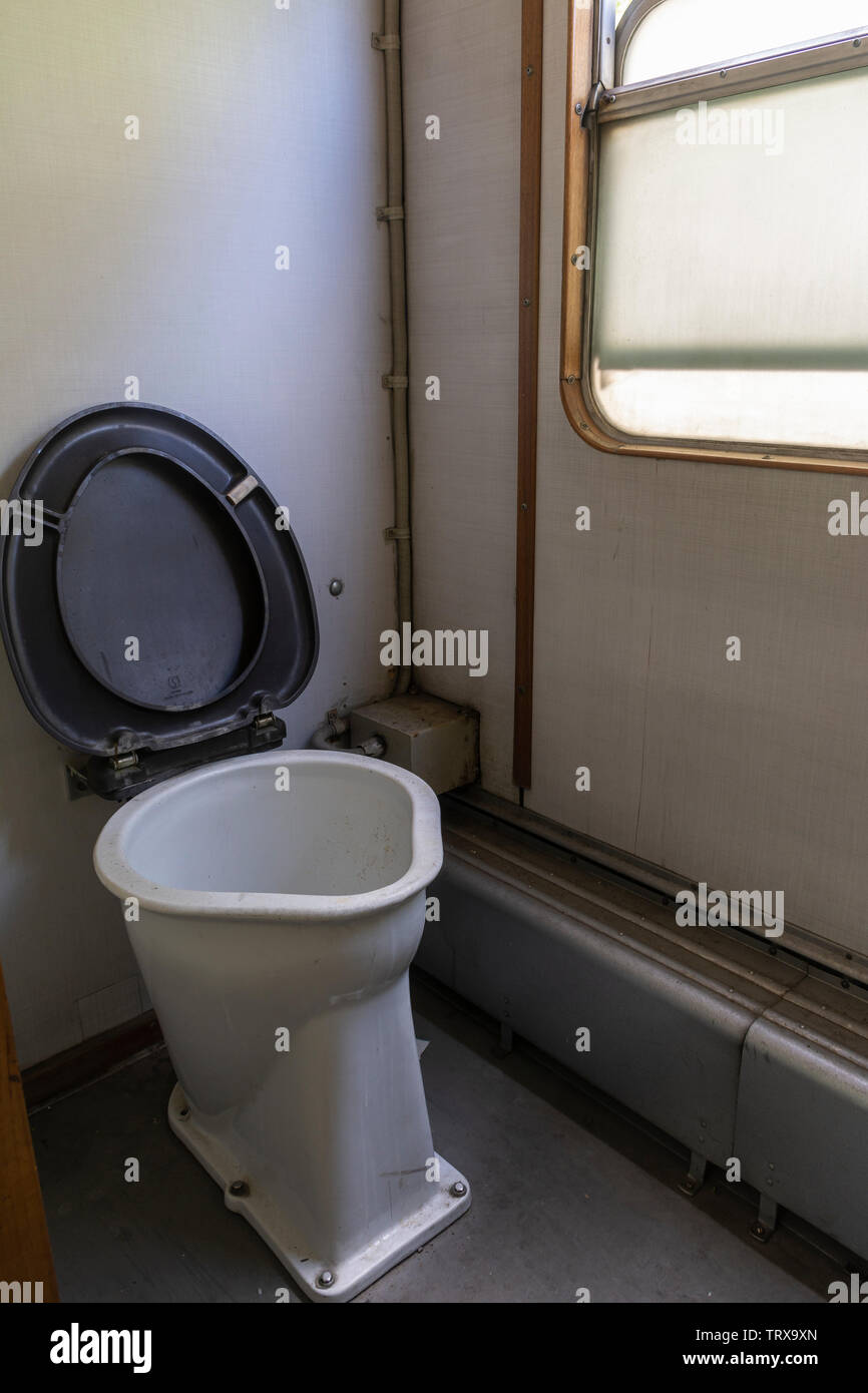 Toilet seat of an old railbus in Lahti Finland Stock Photo