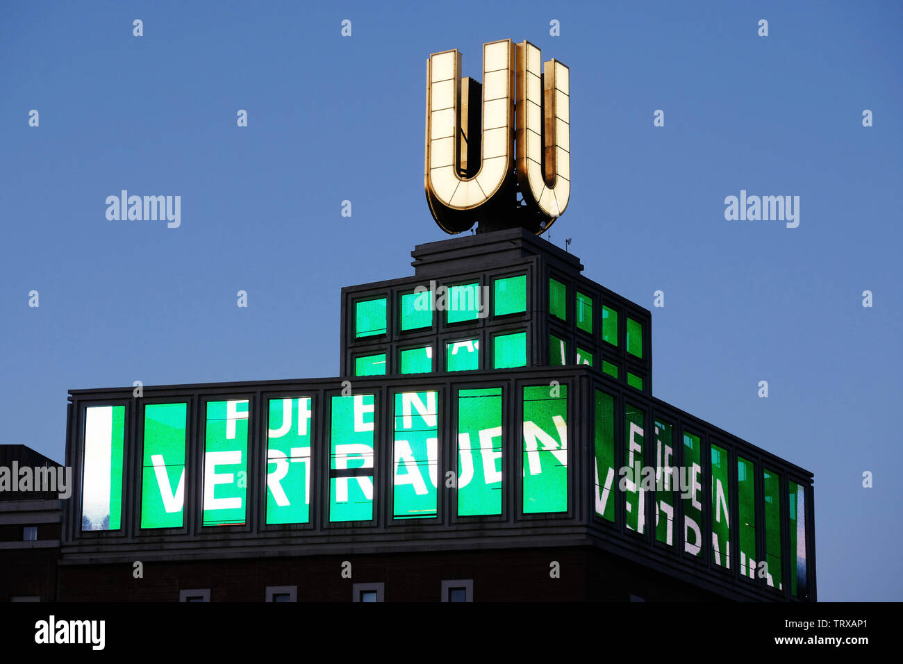 Der Dortmunder U-Turm zeigt ab dem 12.6.19 ein Video mit der Losung zum Evangelischen Kirchentag in Dortmund. Zum Kirchentag hat der Künstler Adolf Winkelmann einen Clip geschaffen, der die Losung des Kirchentages "Was für ein Vertrauen" auf einer wehenden Fahne zeigt.   ---   The Dortmund U-Tower shows from 12.6.19 a video with the slogan for the Protestant Church Congress  in Dortmund. The video artist Adolf Winkelmann has created a clip that shows the slogan of the Kirchentag "What a confidence" on a waving flag. Stock Photo