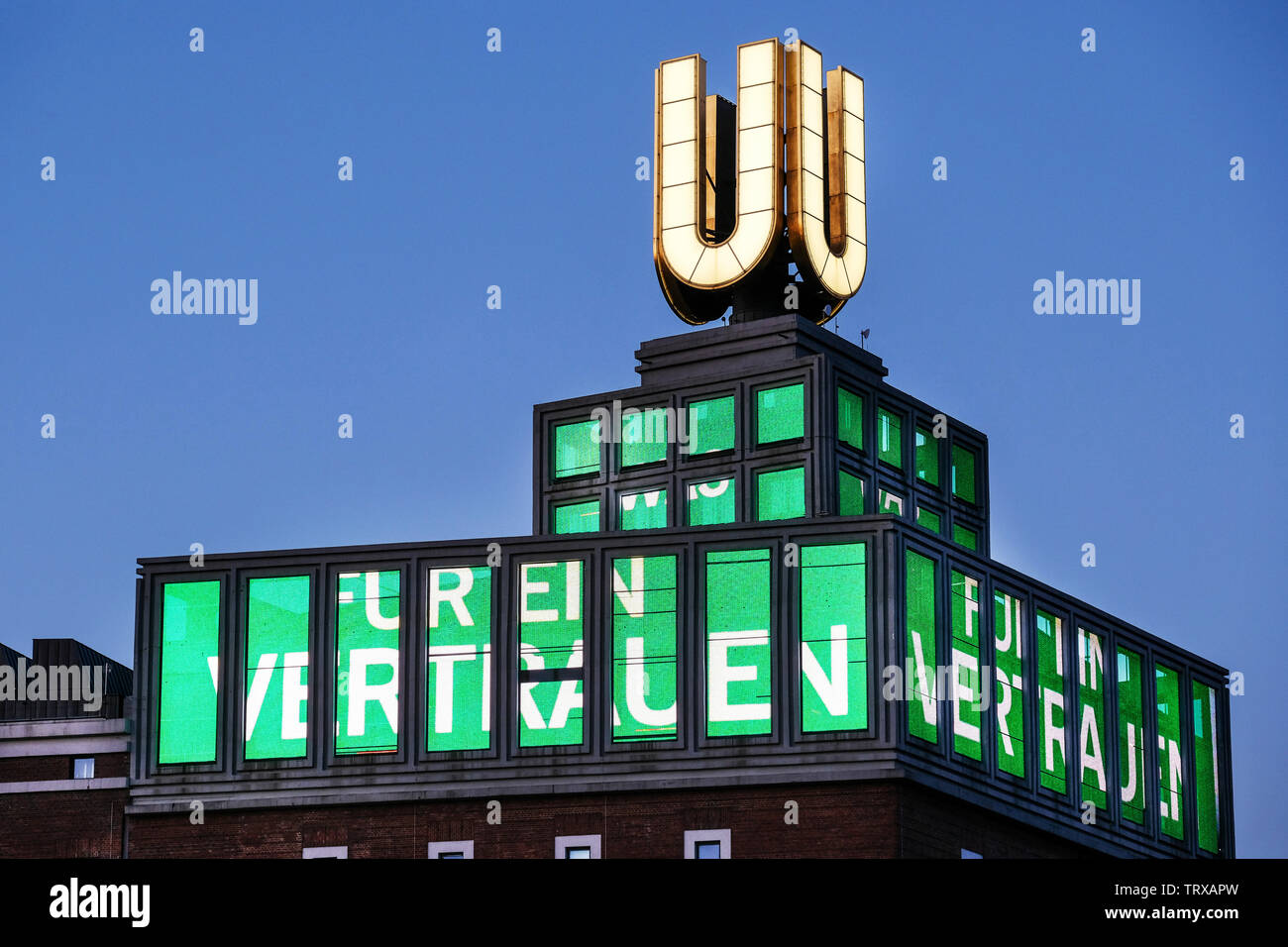 Der Dortmunder U-Turm zeigt ab dem 12.6.19 ein Video mit der Losung zum Evangelischen Kirchentag in Dortmund. Zum Kirchentag hat der Künstler Adolf Winkelmann einen Clip geschaffen, der die Losung des Kirchentages "Was für ein Vertrauen" auf einer wehenden Fahne zeigt.   ---   The Dortmund U-Tower shows from 12.6.19 a video with the slogan for the Protestant Church Congress  in Dortmund. The video artist Adolf Winkelmann has created a clip that shows the slogan of the Kirchentag "What a confidence" on a waving flag. Stock Photo