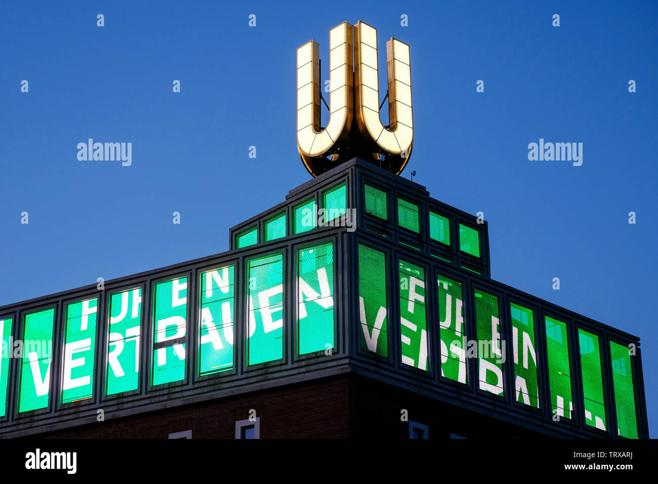 Der Dortmunder U-Turm zeigt ab dem 12.6.19 ein Video mit der Losung zum Evangelischen Kirchentag in Dortmund. Zum Kirchentag hat der Künstler Adolf Winkelmann einen Clip geschaffen, der die Losung des Kirchentages "Was für ein Vertrauen" auf einer wehenden Fahne zeigt.   ---   The Dortmund U-Tower shows from 12.6.19 a video with the slogan for the Protestant Church Congress  in Dortmund. The video artist Adolf Winkelmann has created a clip that shows the slogan of the Kirchentag "What a confidence" on a waving flag. Stock Photo