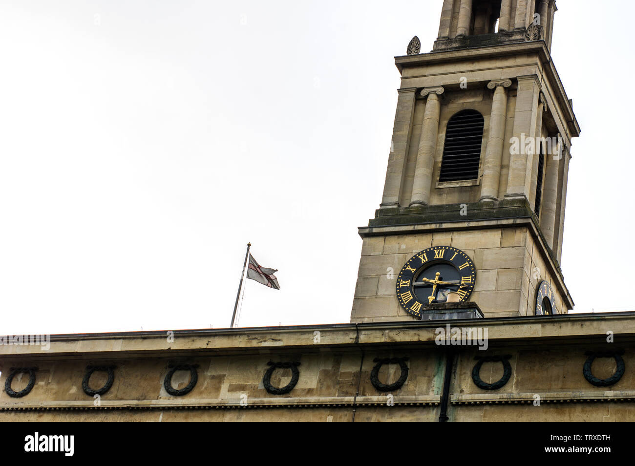 Clock tower of Saint John's Church in Waterloo at 6.15 near the IMAX and Waterloo Station Stock Photo