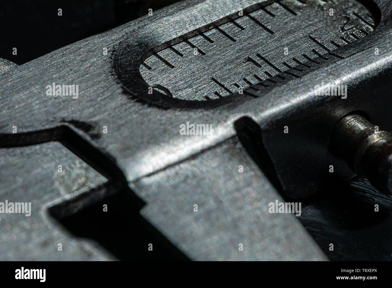 Macro Image of a carpenter's caliper.  The tool is obviously well used and an important tool to the owner. Stock Photo