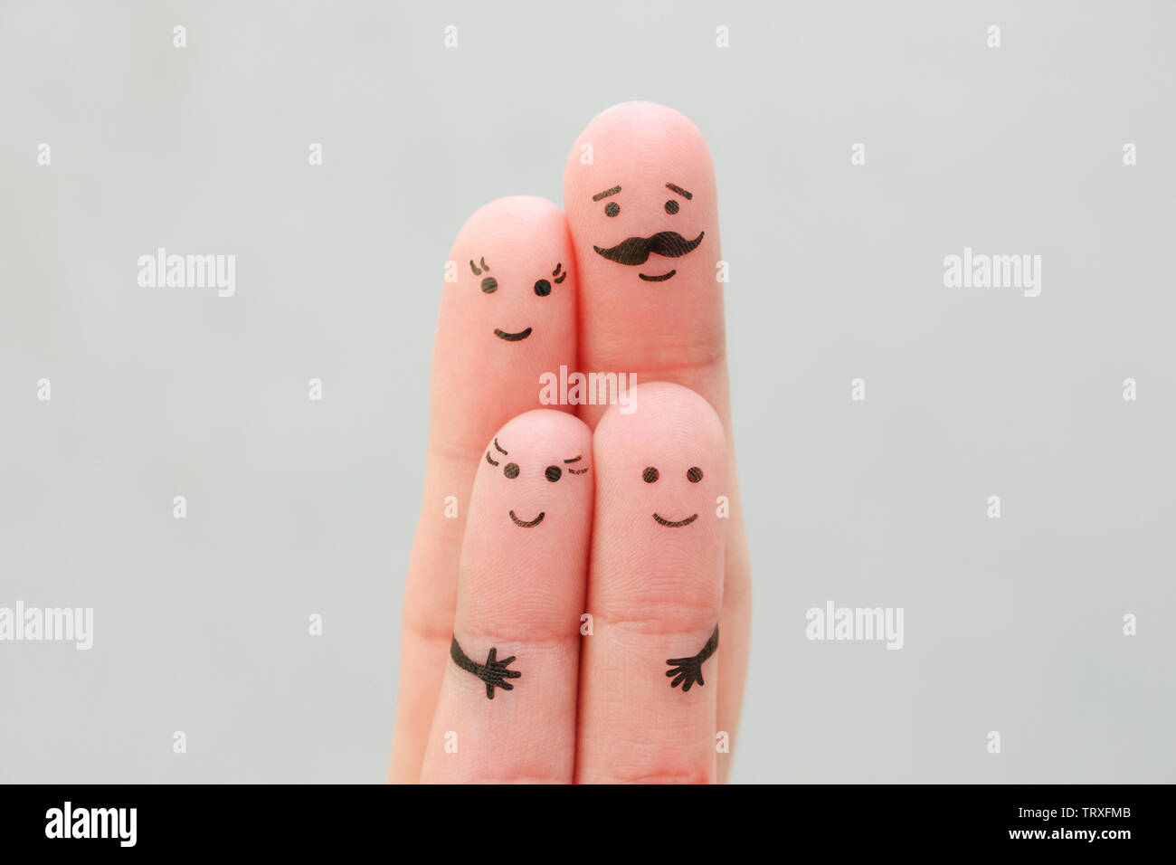 Fingers art of happy family. Concept parents and children together. Stock Photo