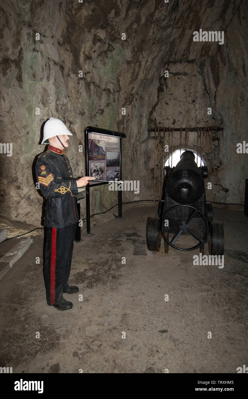 Military helmet and cannon Stock Photo