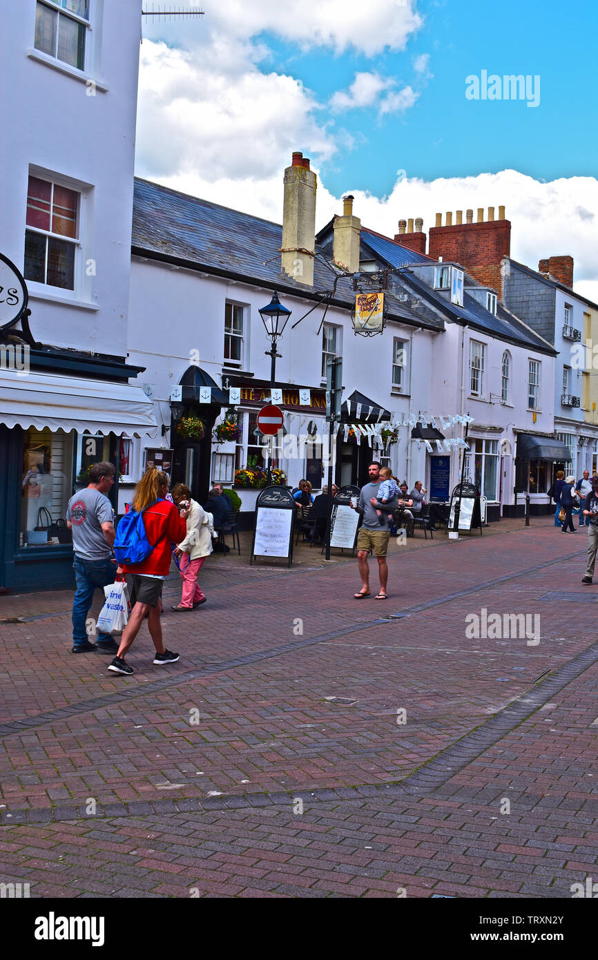 People enjoying sitting outside the Anchor Inn, a traditional public