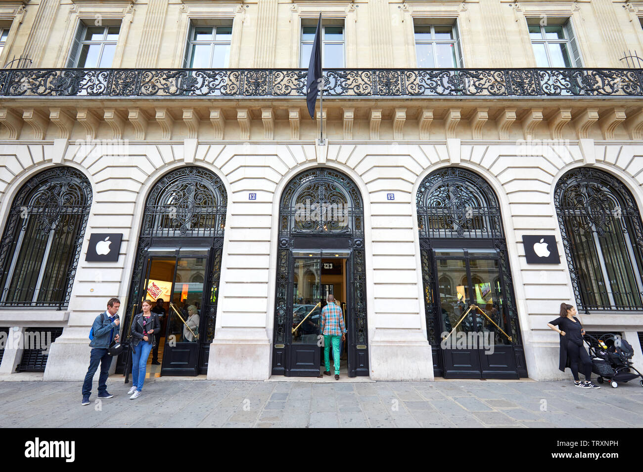 PARIS, FRANCE - JULY 21, 2017: Apple store exterior with people and building facade in Paris, France. Stock Photo