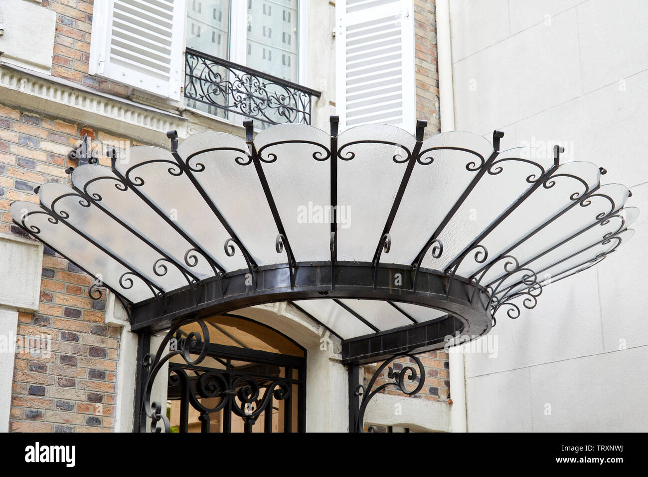 PARIS, FRANCE - JULY 23, 2017: Art Nouveau canopy in glass and black wrought iron in Paris, France Stock Photo