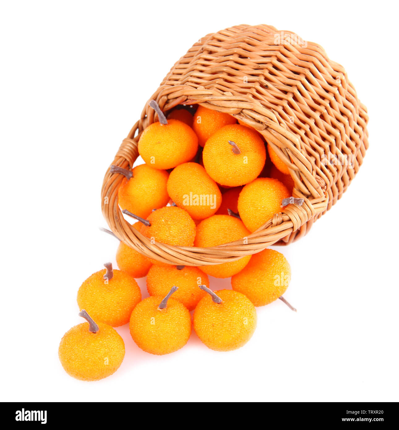 Small tangerines in wicker basket, isolated on white Stock Photo Alamy