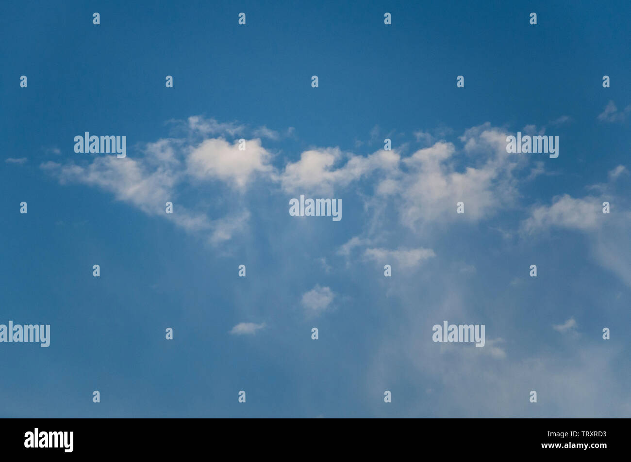 fluffy clouds on a sunny day Stock Photo - Alamy
