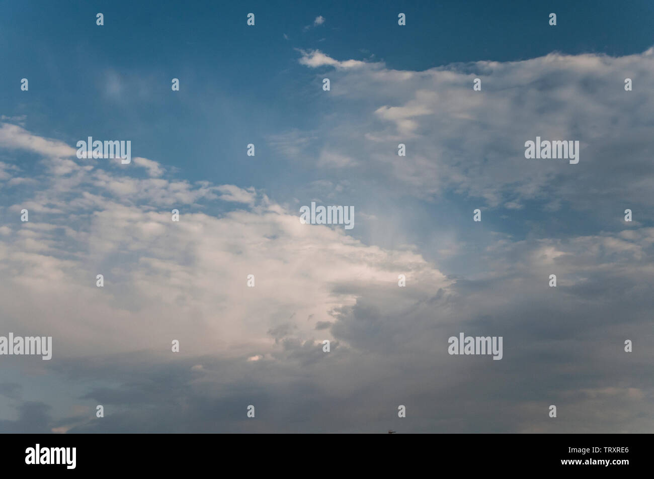 fluffy clouds on a sunny day Stock Photo - Alamy