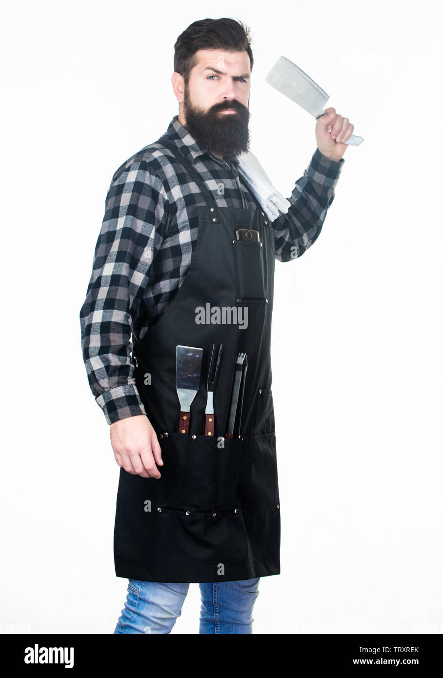 Perfect for precise cutting. Brutal cook holding butcher axe. Butcher