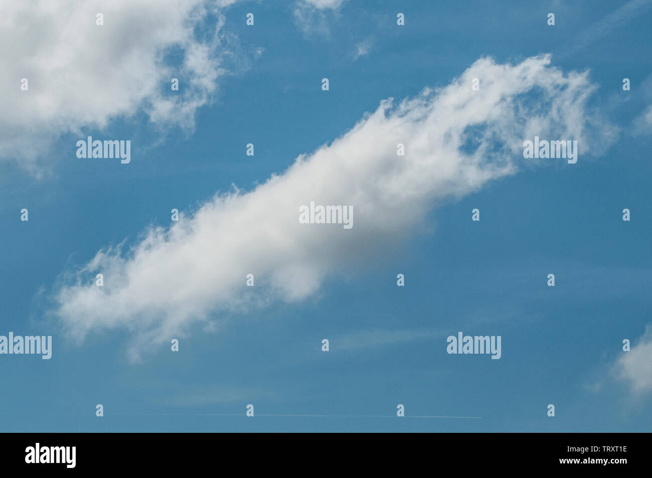 fluffy clouds on a sunny day Stock Photo - Alamy