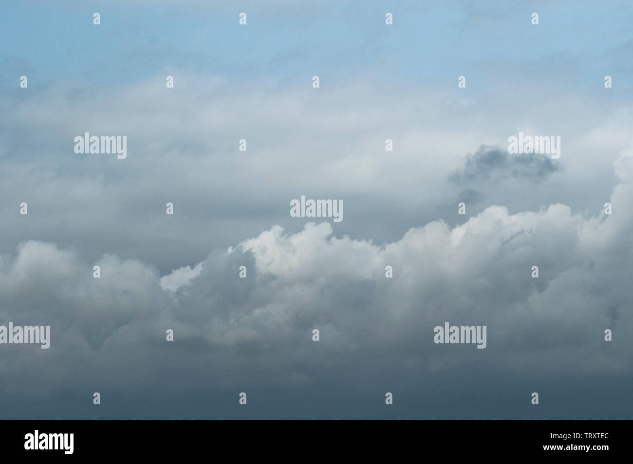 fluffy clouds on a sunny day Stock Photo - Alamy