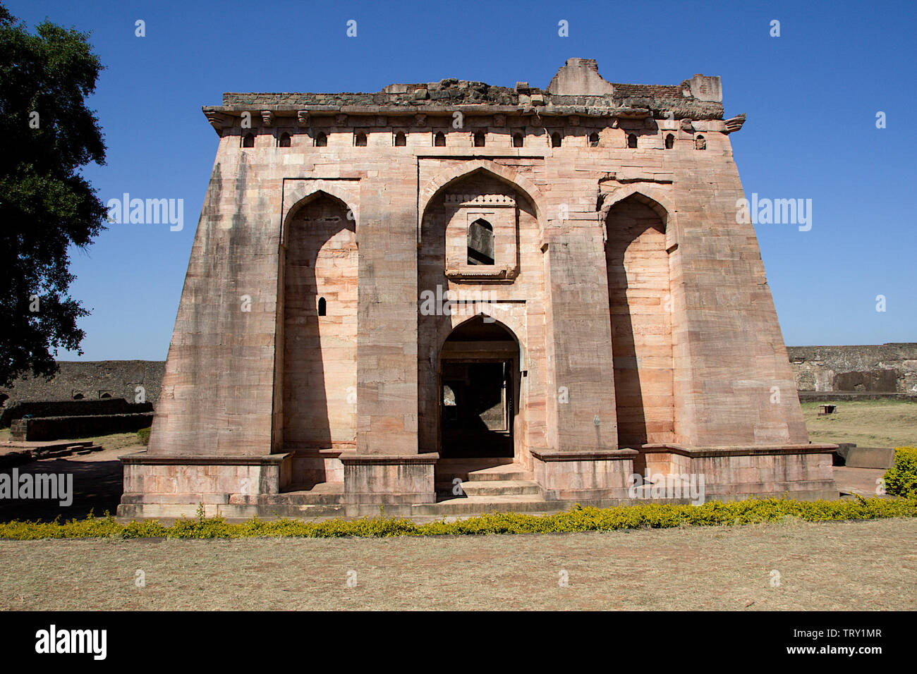 Frontal view of Hindola Mahal or Swinging Palace audience hall with sloping side walls at Mandu, Madhya Pradesh, India, Asia Stock Photo