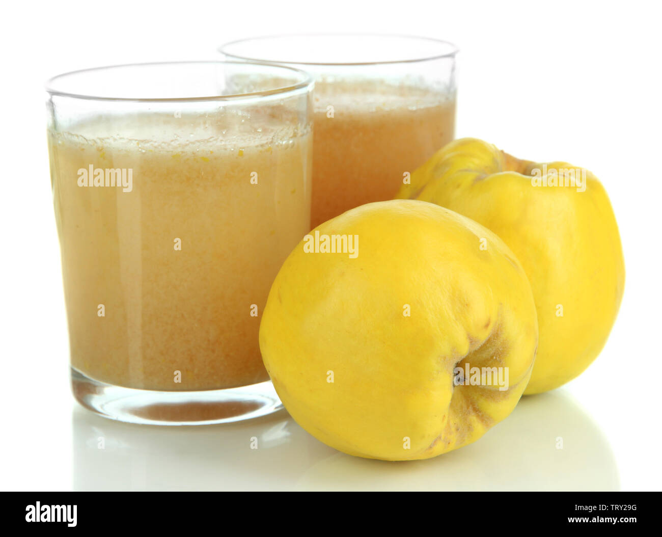 Sweet quince with juice isolated on white Stock Photo Alamy
