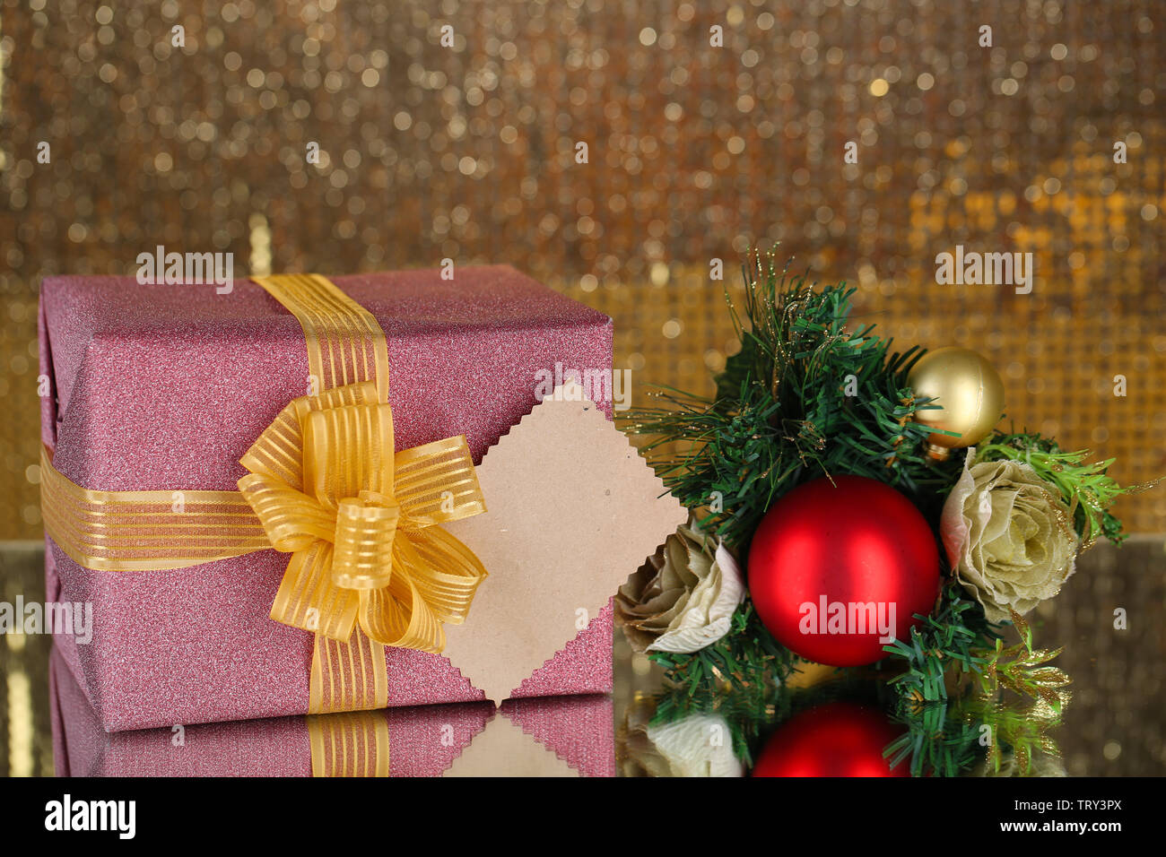 Gift Boxes With Blank Label And Christmas Decorations On Table On