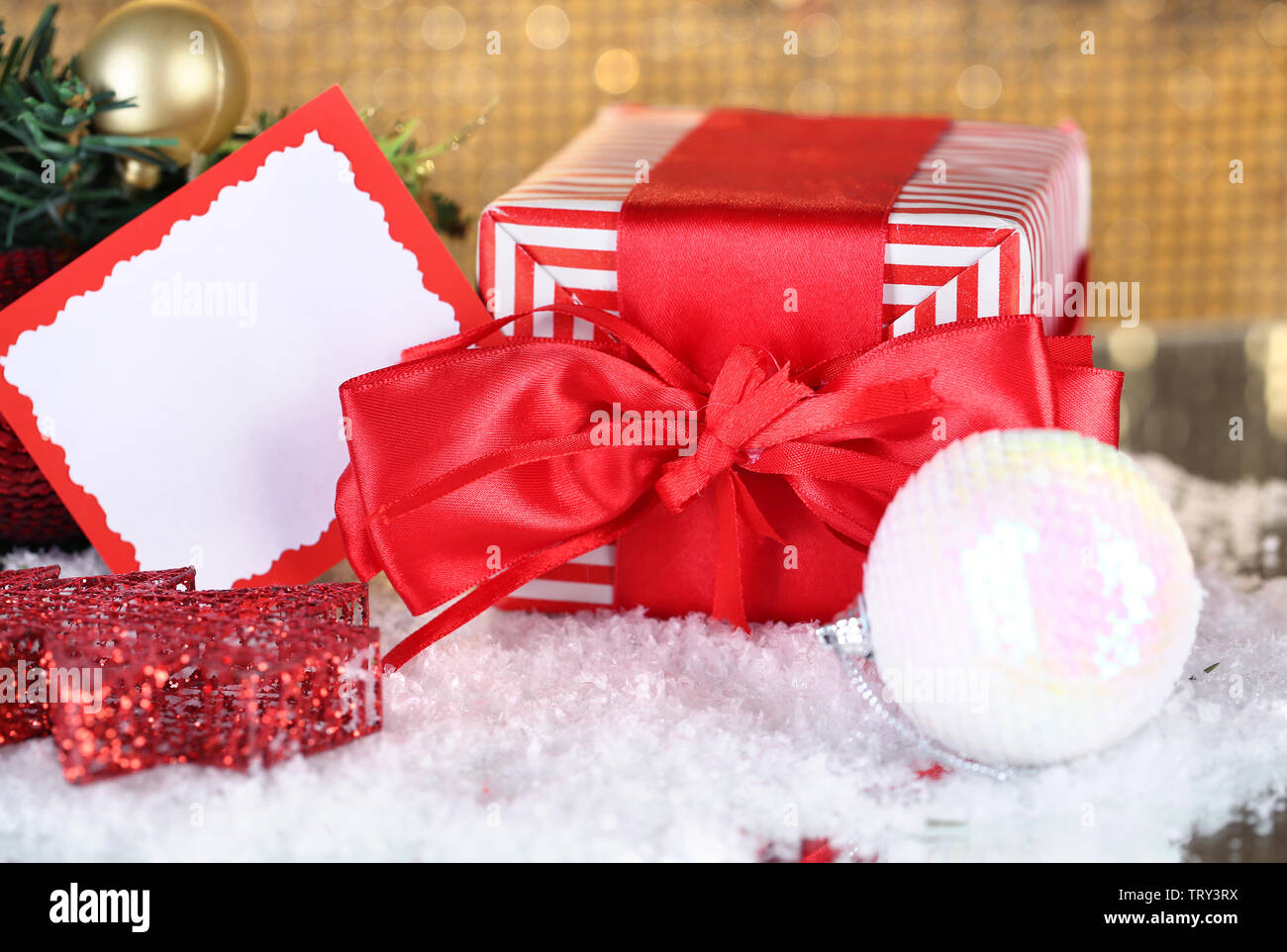 Gift Boxes With Blank Label And Christmas Decorations On Table On