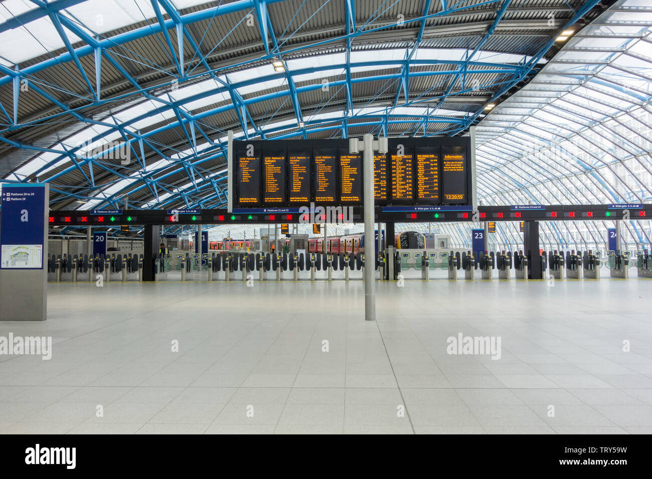 An empty former Eurostar Waterloo International Terminal which has now been reopened for Network Rail train services and commuter services Stock Photo