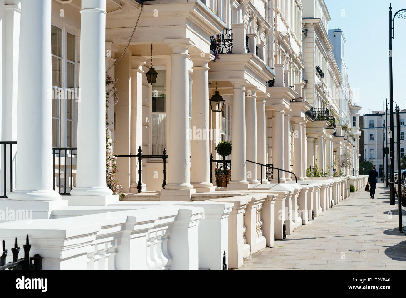 Residential townhouses and pedestrian walkway in Notting Hill, London England, UK Stock Photo