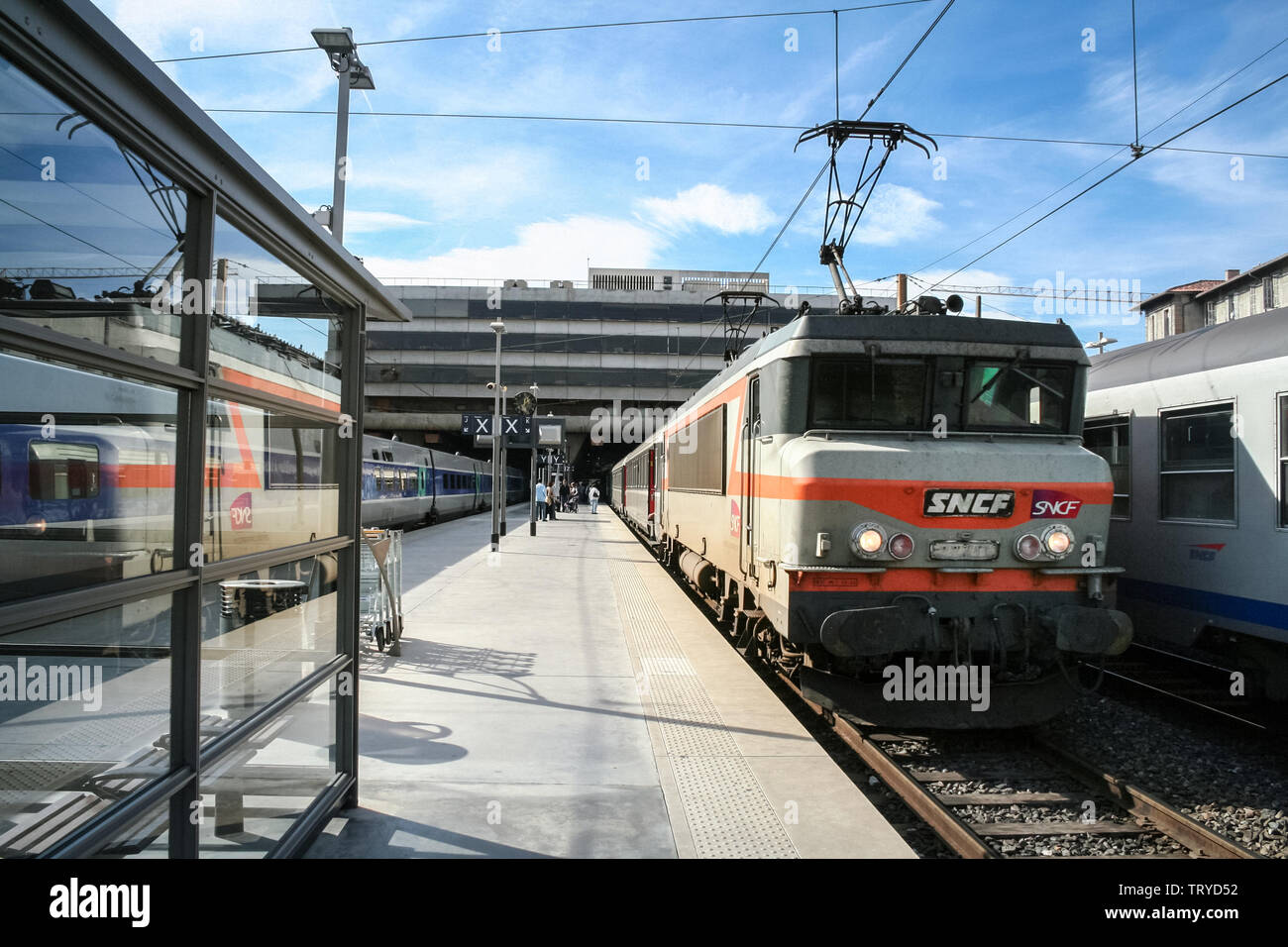 MARSEILLE, FRANCE - OCTOBER 29, 2006: Passenger TER Regional Train in Marseille Saint Charles train station, belonging to SNCF company seen in front. Stock Photo