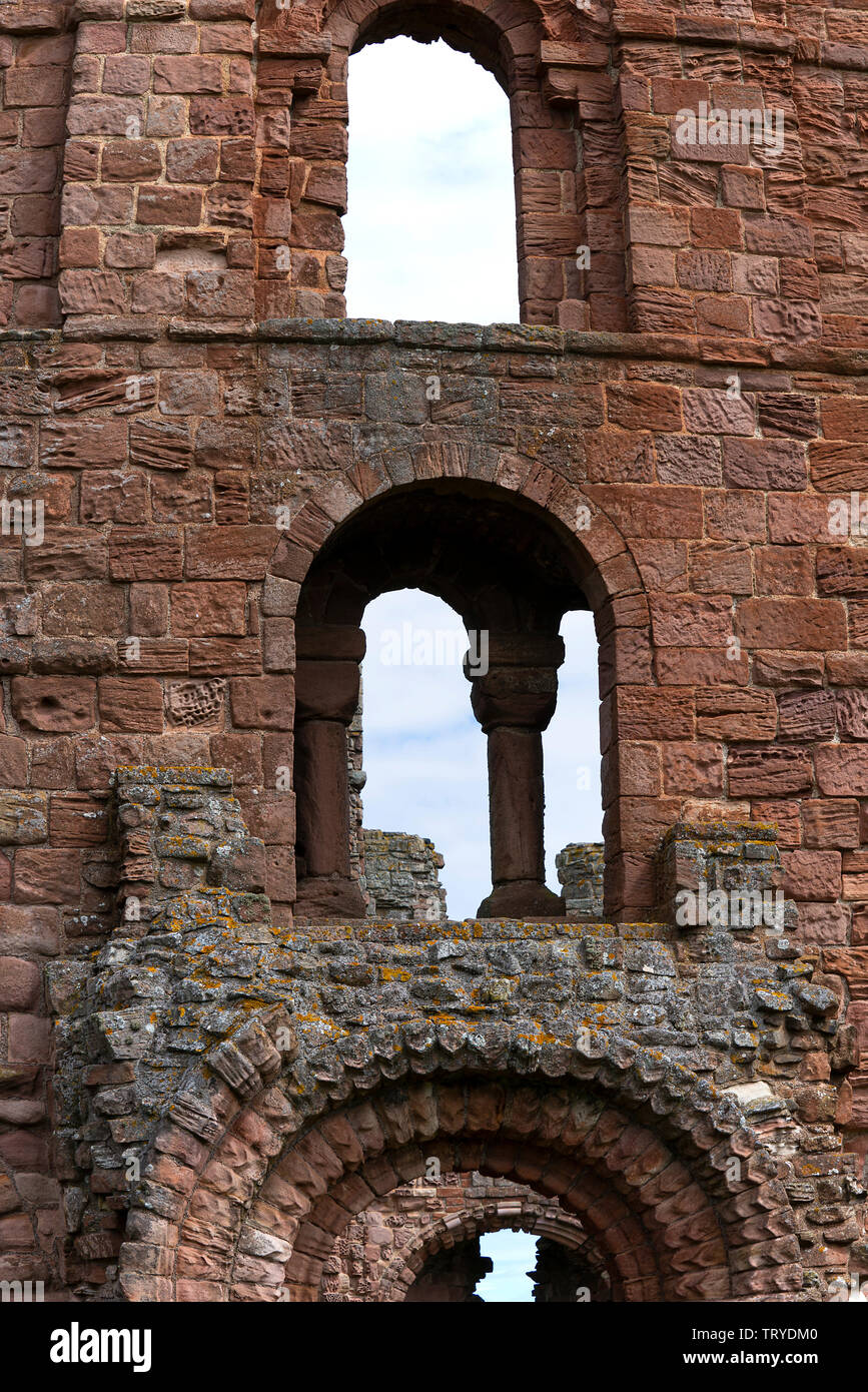 Part of the Ruined Anglo-Saxon Lidisfarne Priory on Holy Island Northumberland England United Kingdom UK Stock Photo