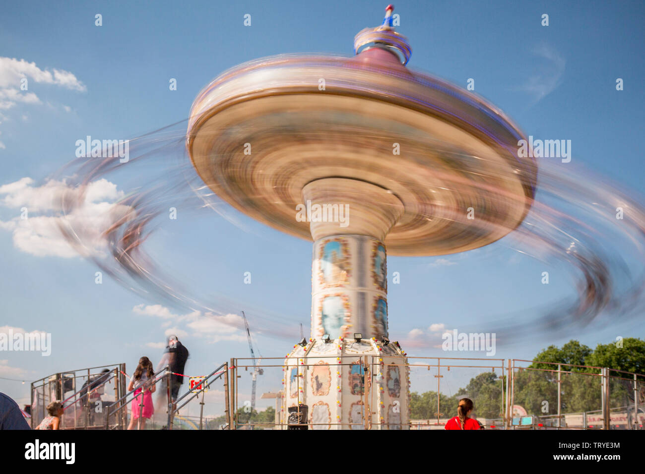 Swing ride in a London park Stock Photo - Alamy