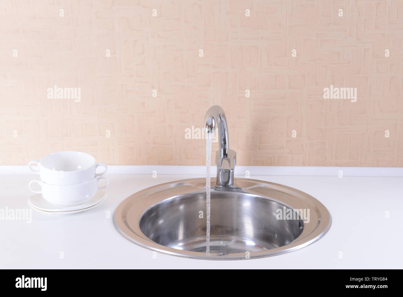 Water tap and sink in modern kitchen Stock Photo - Alamy