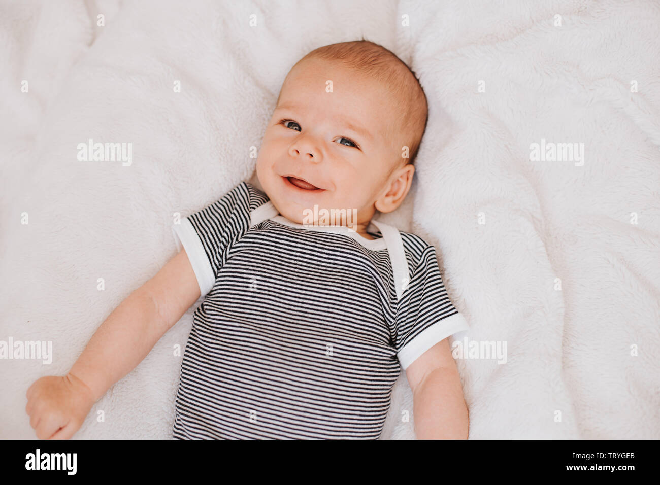 high angle view of smiling toddler Stock Photo