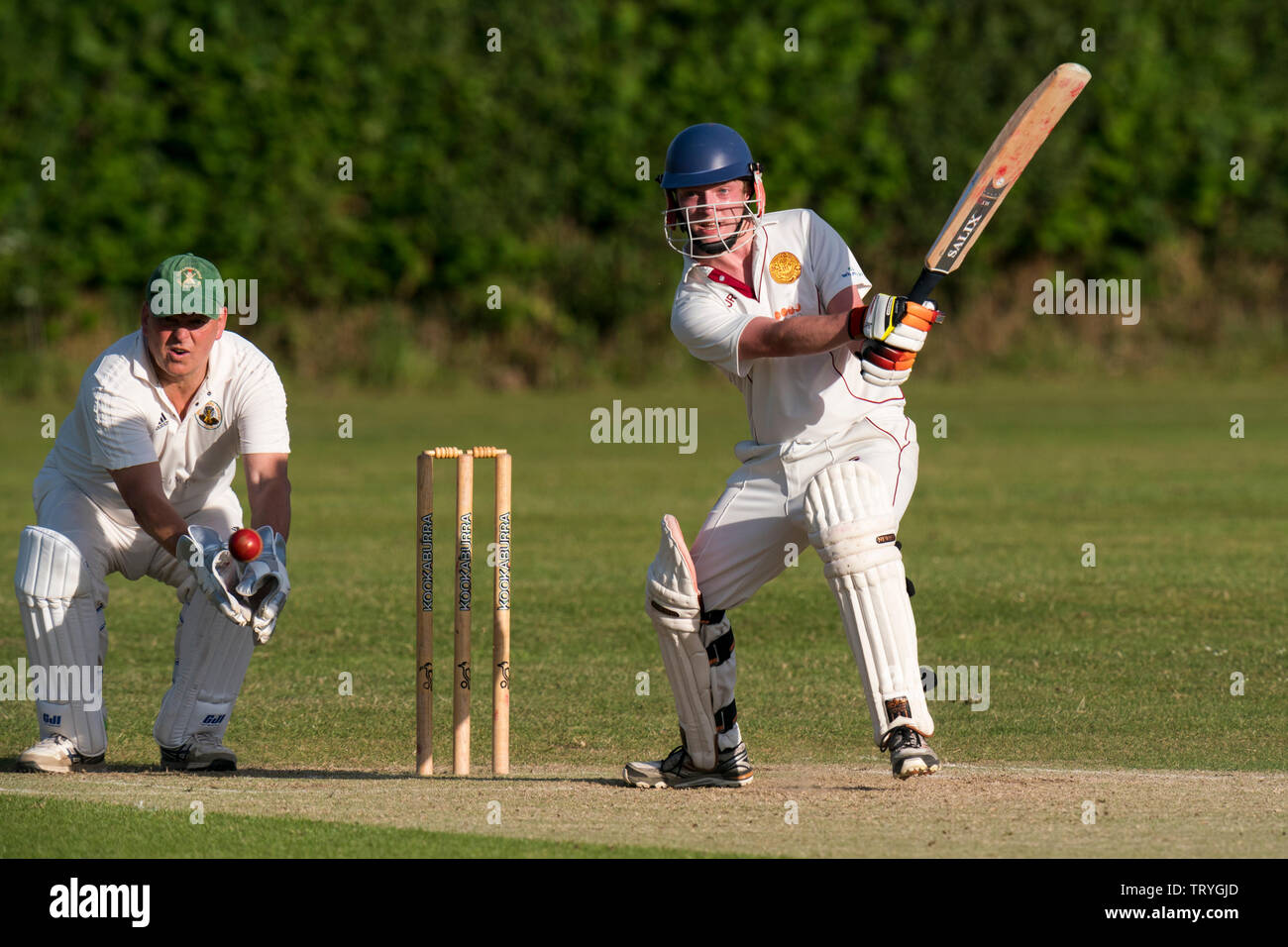 Batsman in action. Stock Photo