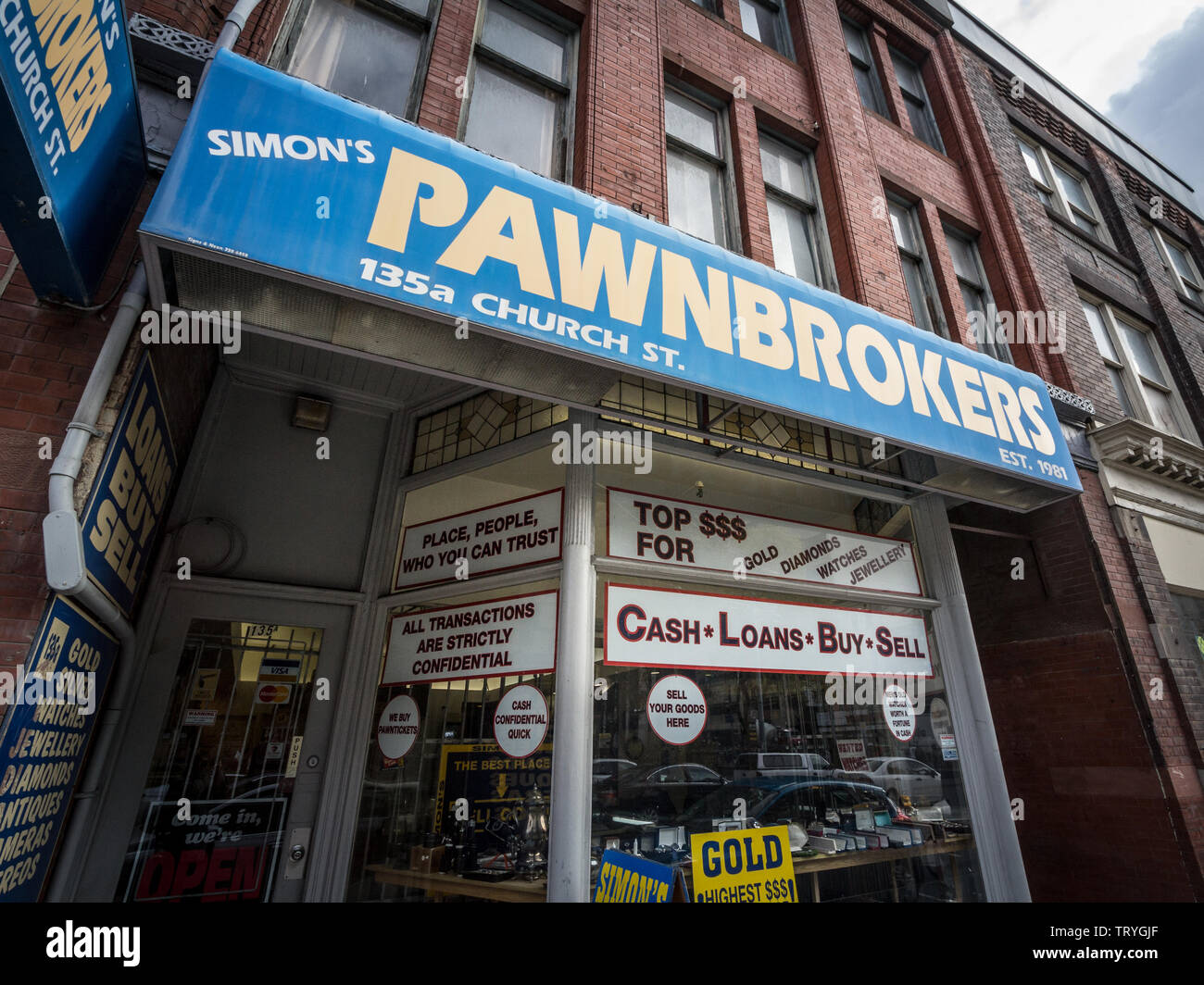 TORONTO, CANADA - NOVEMBER 14, 2018: Pawnbroker main entrance in downtown Toronto. A Pawn Shop is a business offering loans & money in exchange of obj Stock Photo