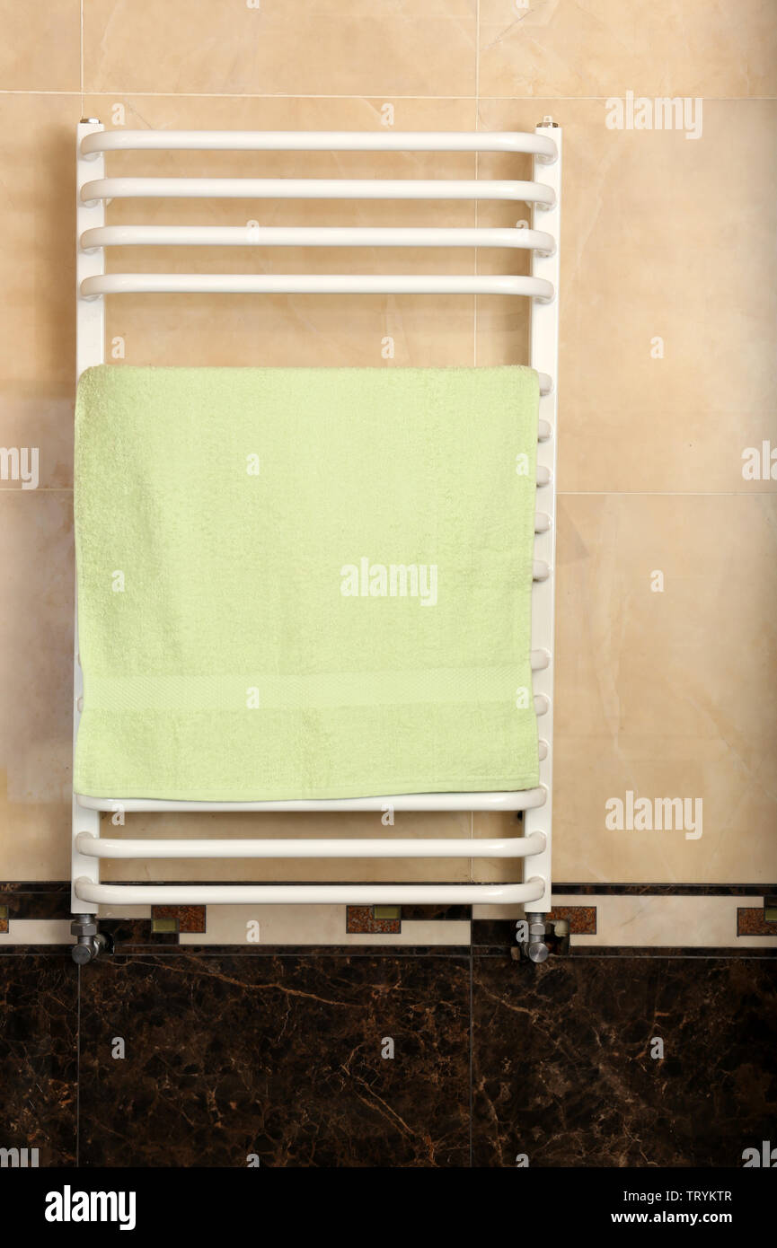 Color towels on radiator in bathroom Stock Photo Alamy