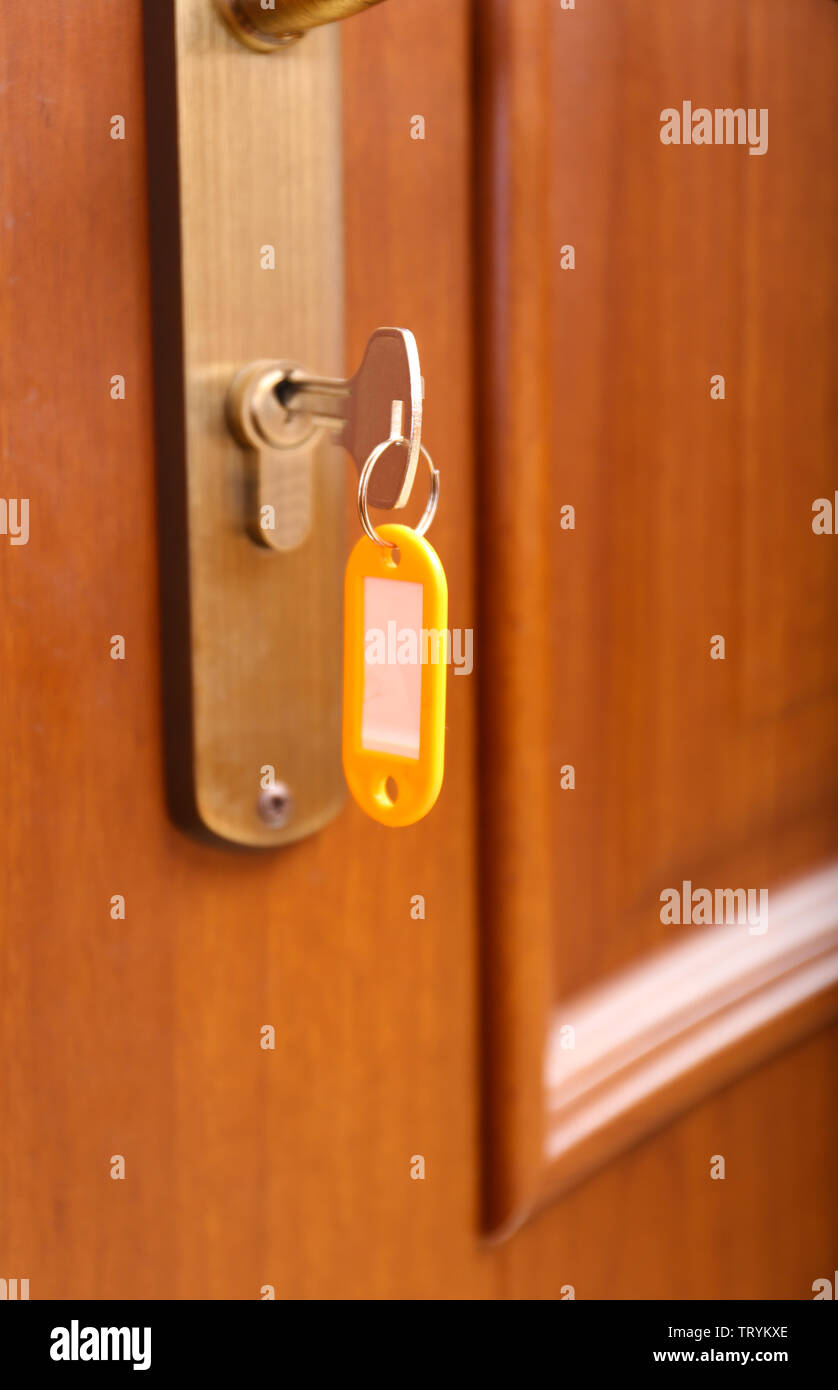 Locking up or unlocking door with key Stock Photo Alamy