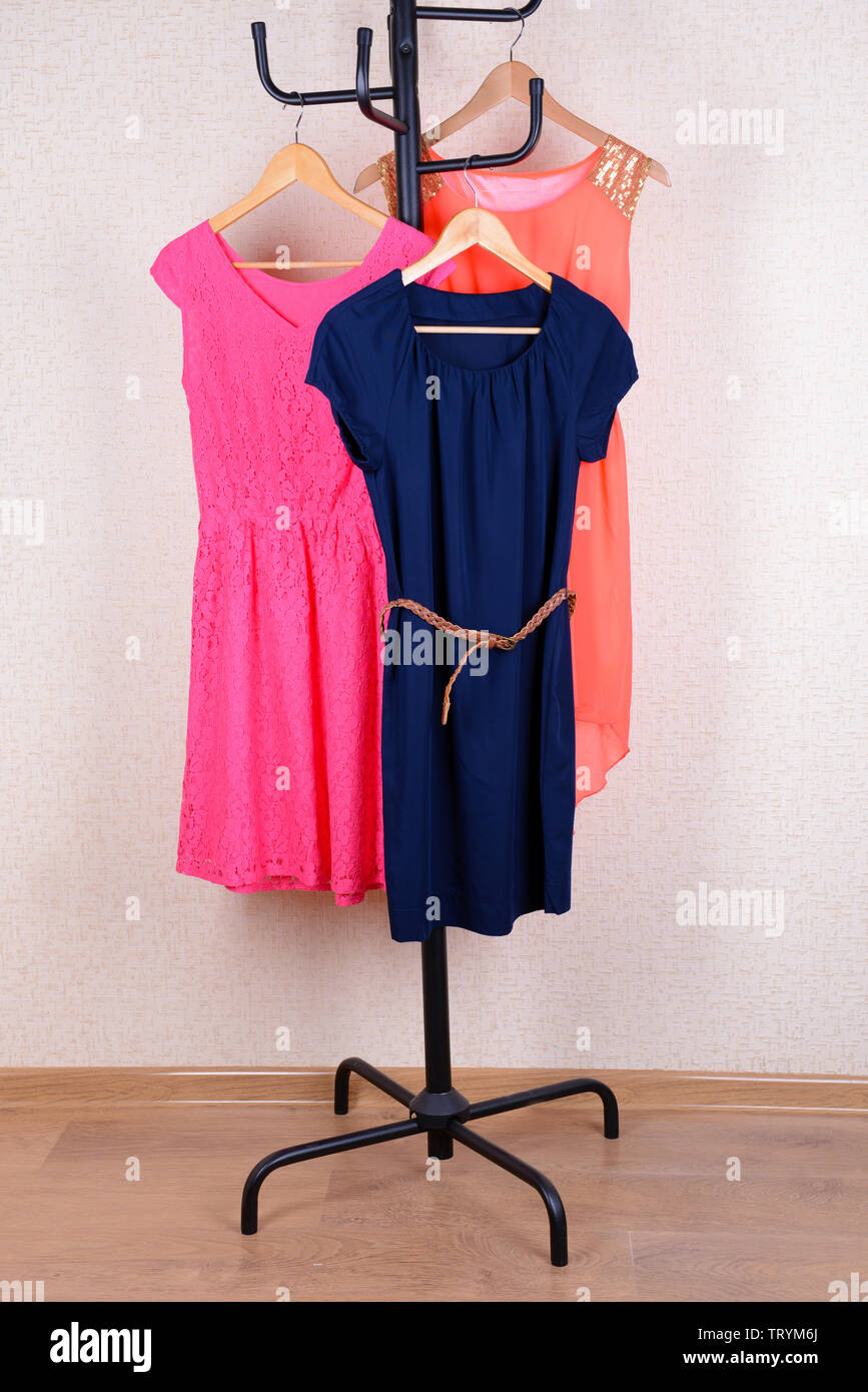 Dresses hanging on hanger Stock Photo