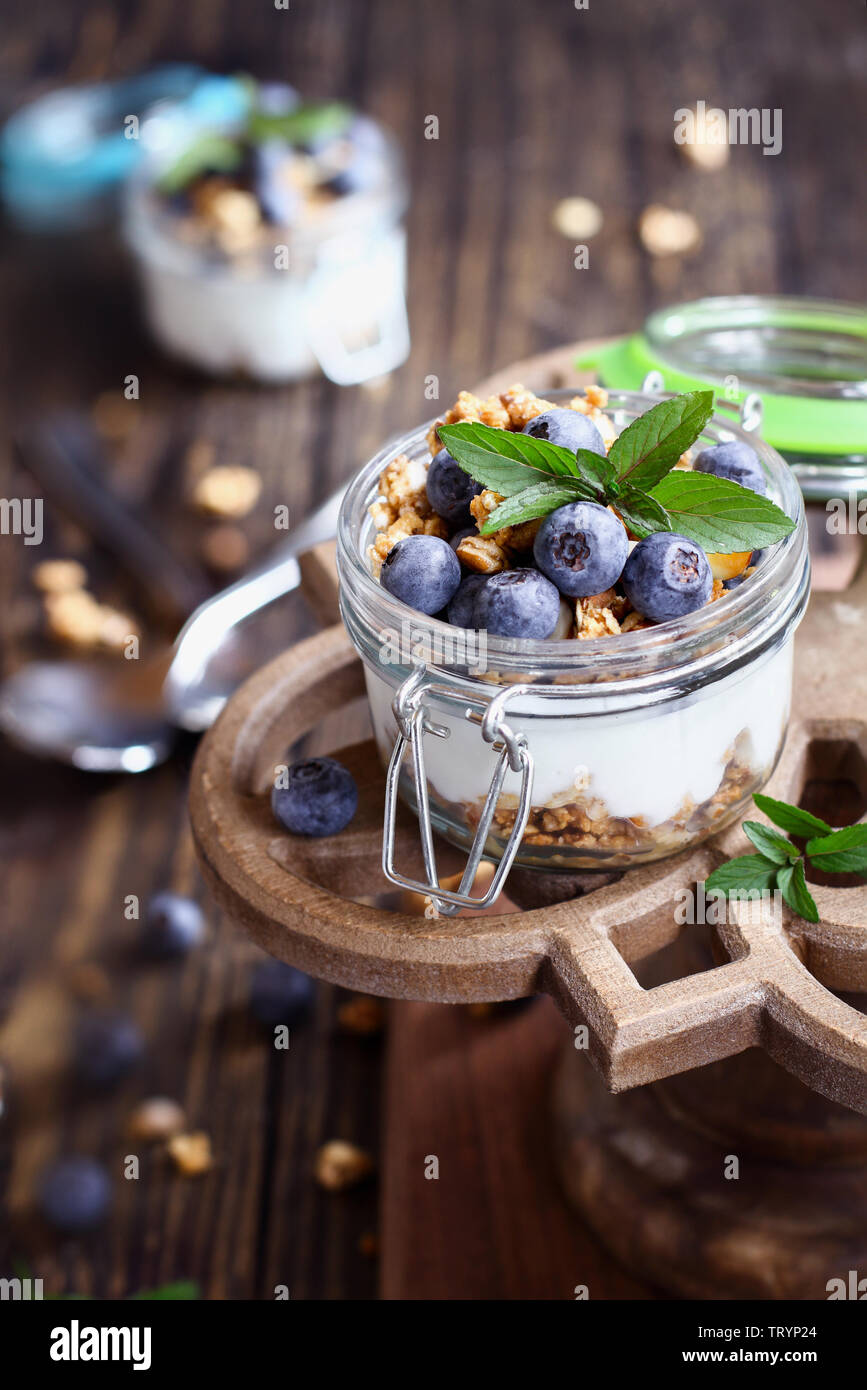 Healthy breakfast of blueberry parfaits made with fresh fruit, Greek