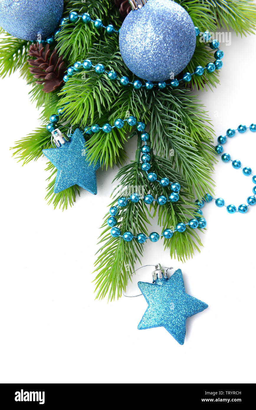 Christmas balls and decorative stars on fir tree, isolated on white ...