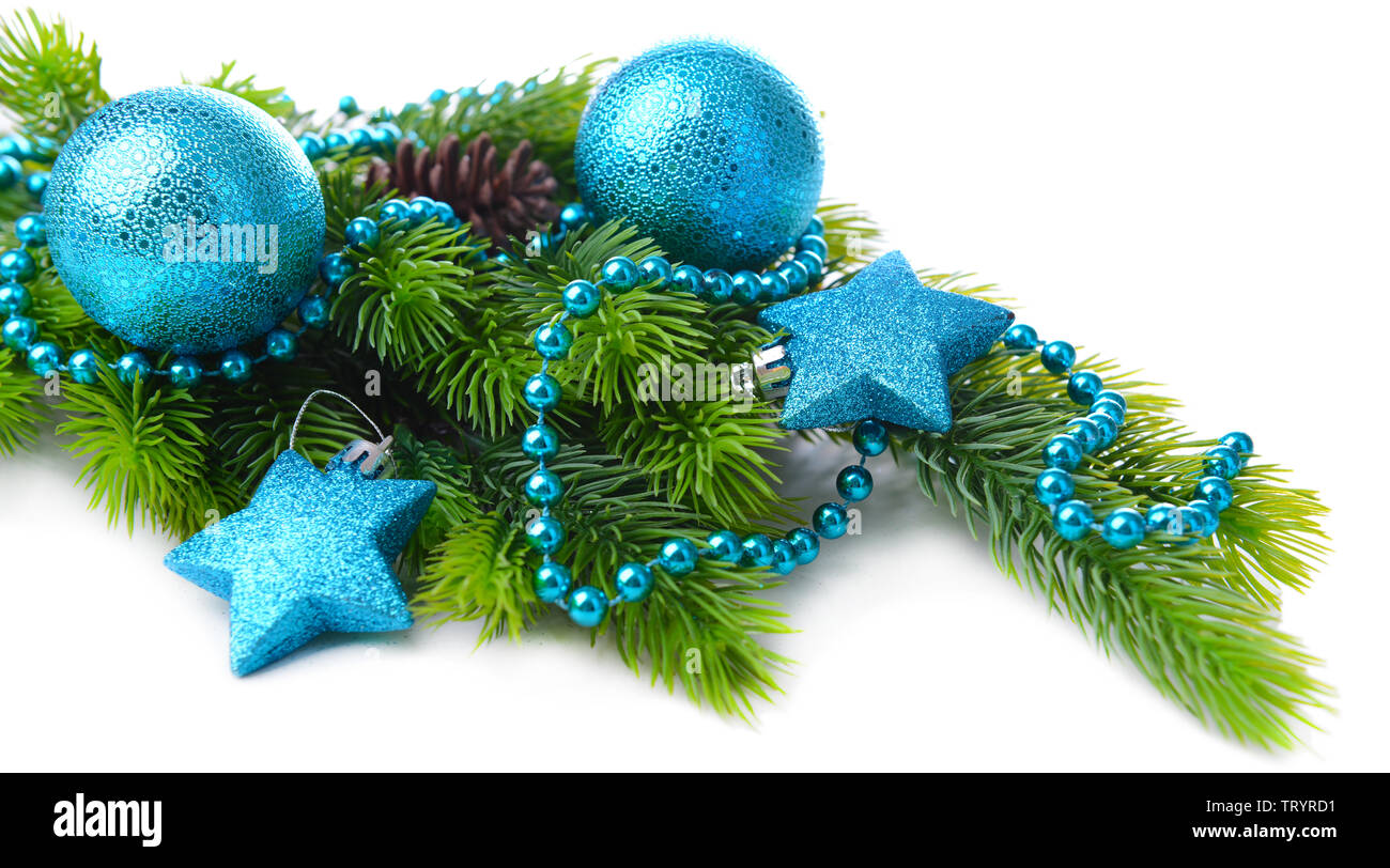 Christmas balls and decorative stars on fir tree, isolated on white ...