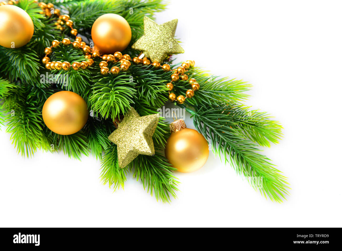 Christmas balls and decorative stars on fir tree, isolated on white ...