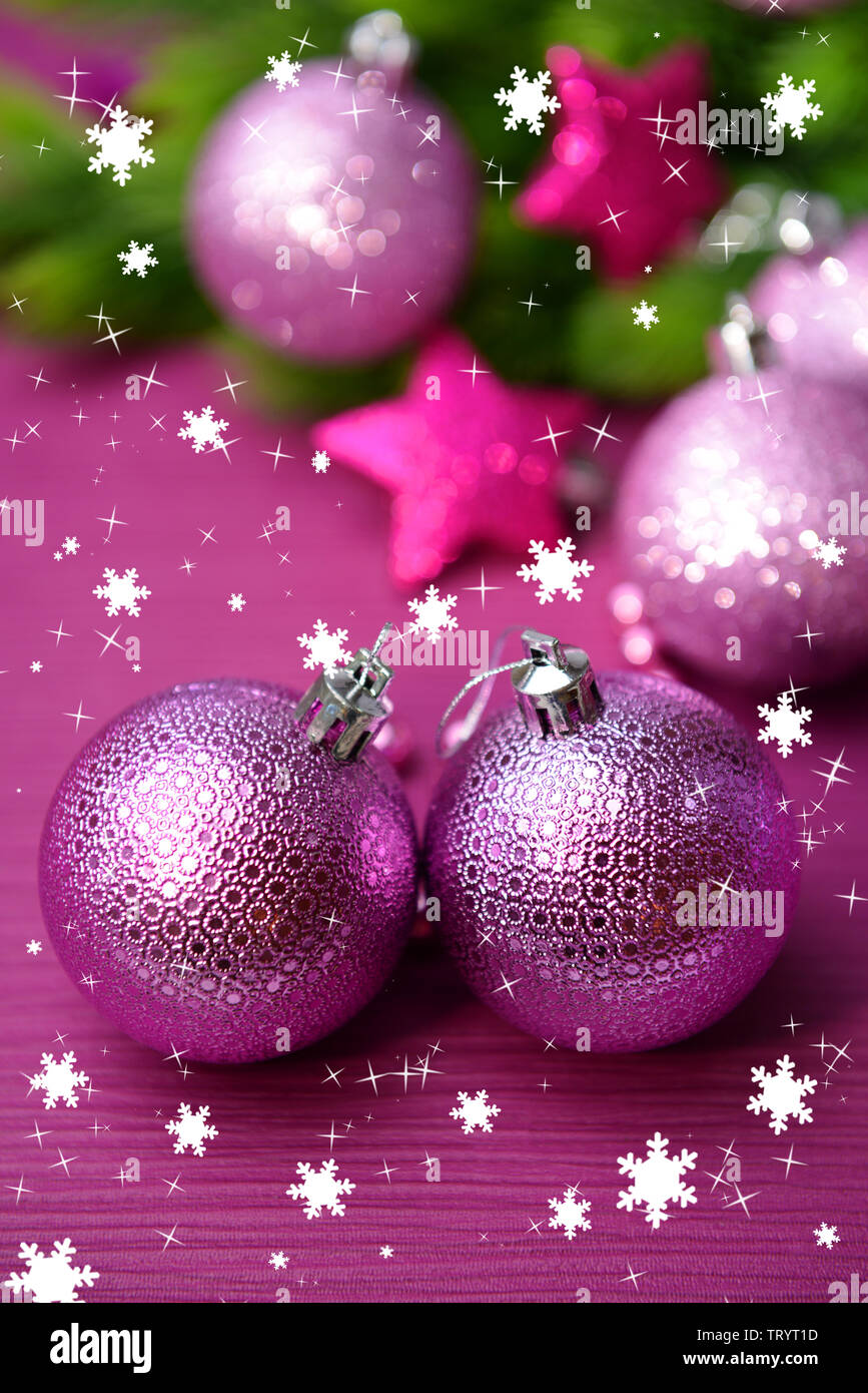 Christmas balls on fir tree, on color background Stock Photo - Alamy