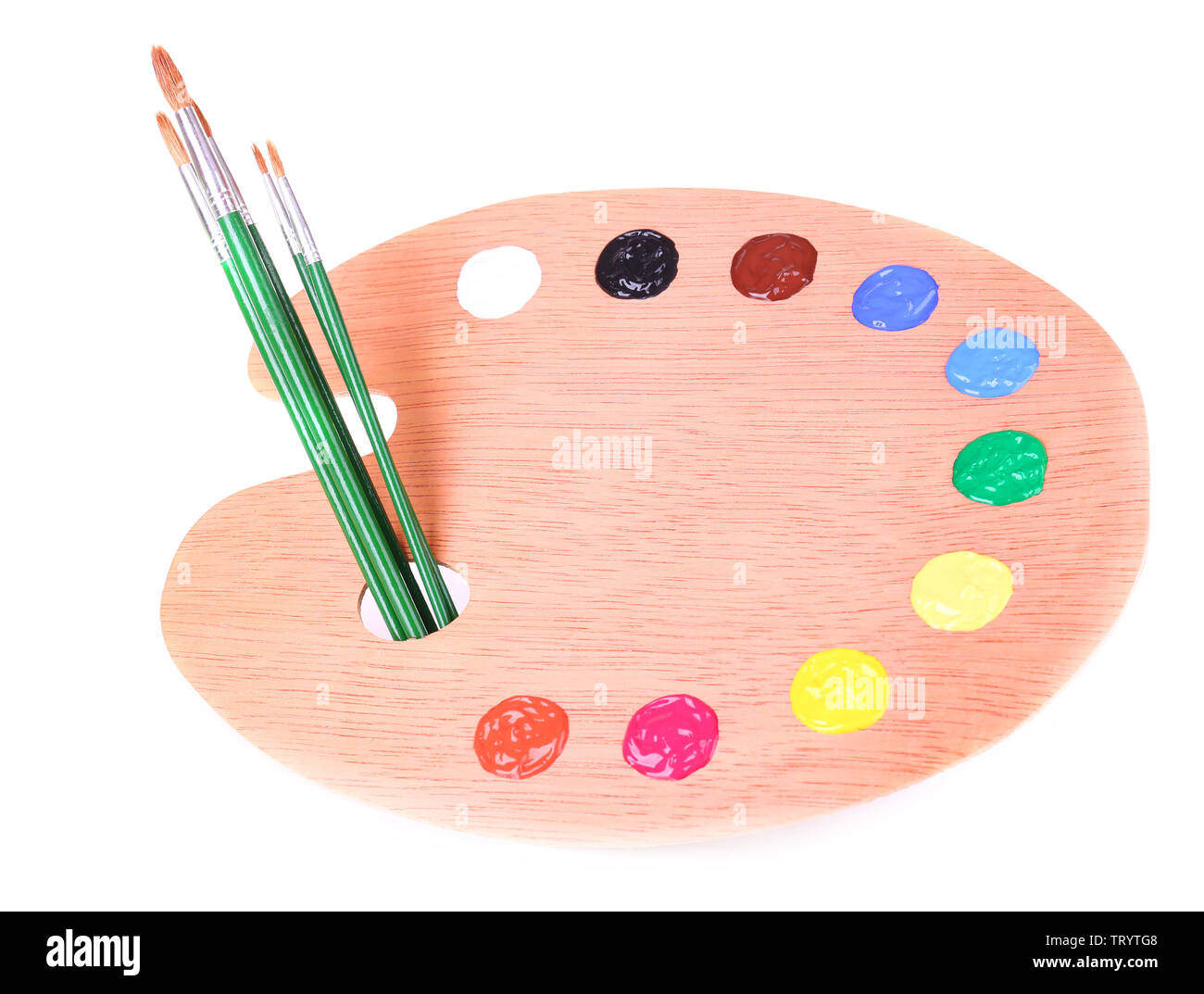 Wooden art palette with paint and brushes isolated on white Stock Photo ...
