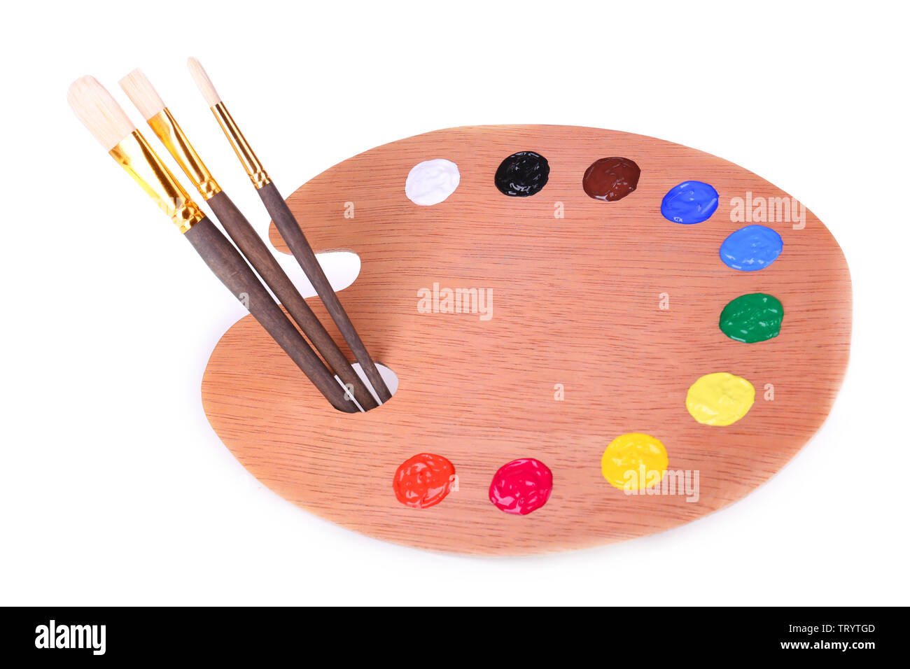 Wooden art palette with paint and brushes isolated on white Stock Photo ...