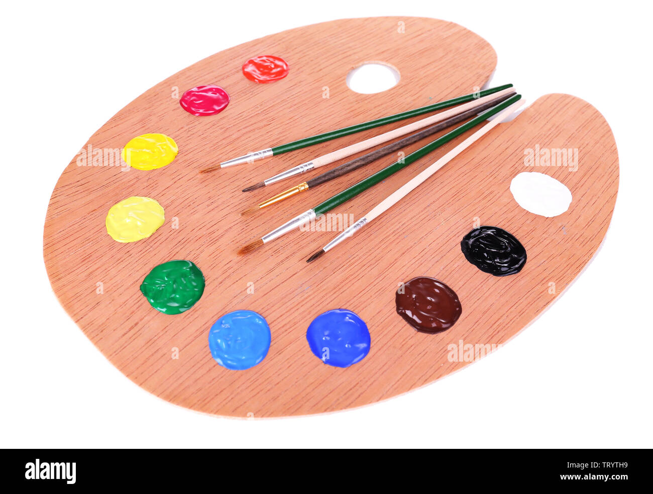 Wooden art palette with paint and brushes isolated on white Stock Photo ...
