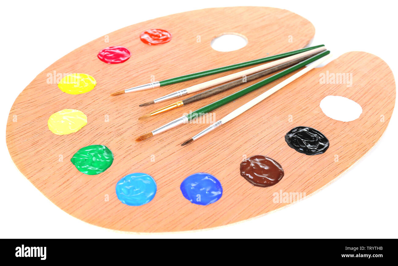 Wooden art palette with paint and brushes isolated on white Stock Photo ...