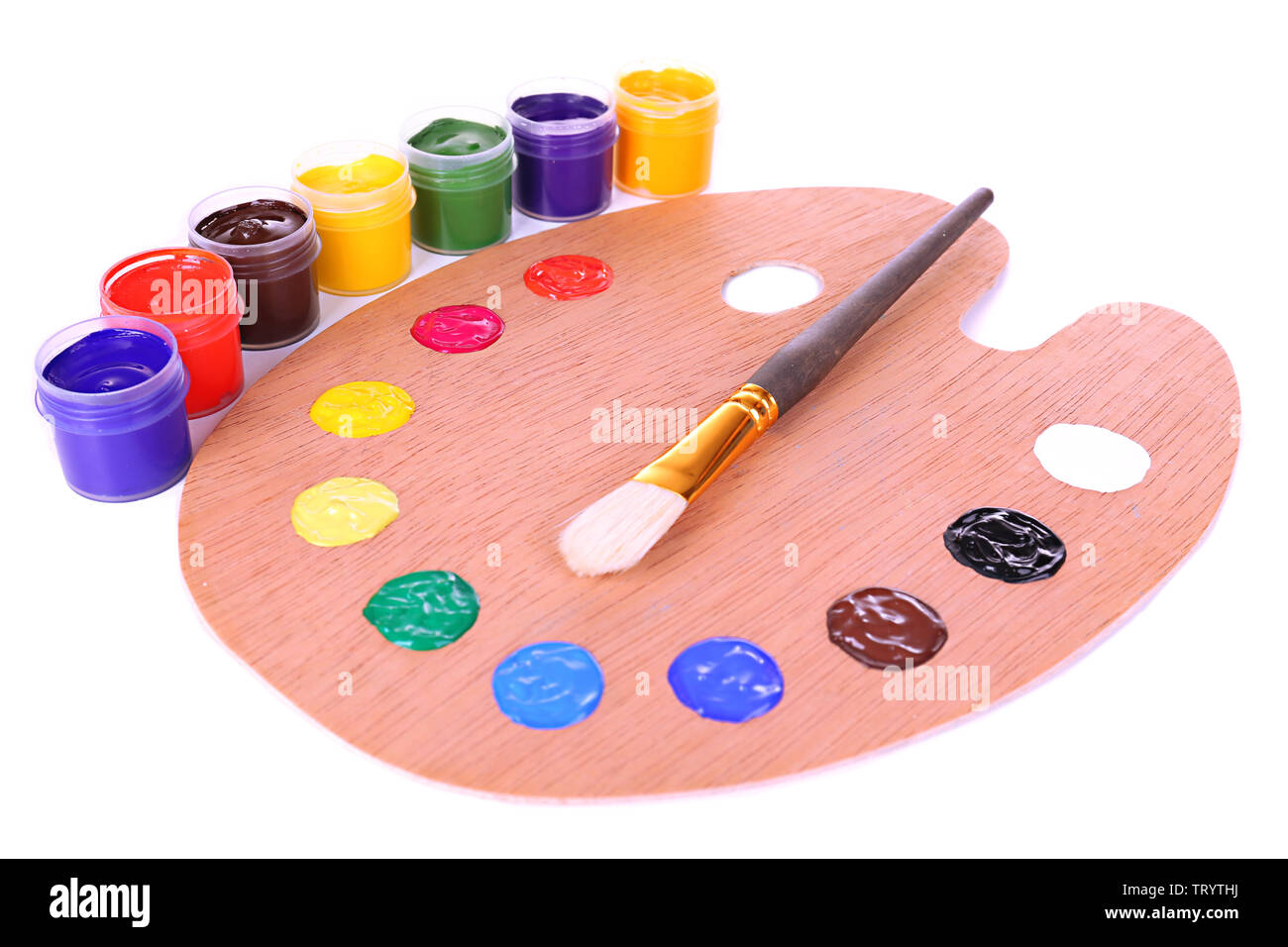 Wooden art palette with paint and brush isolated on white Stock Photo ...