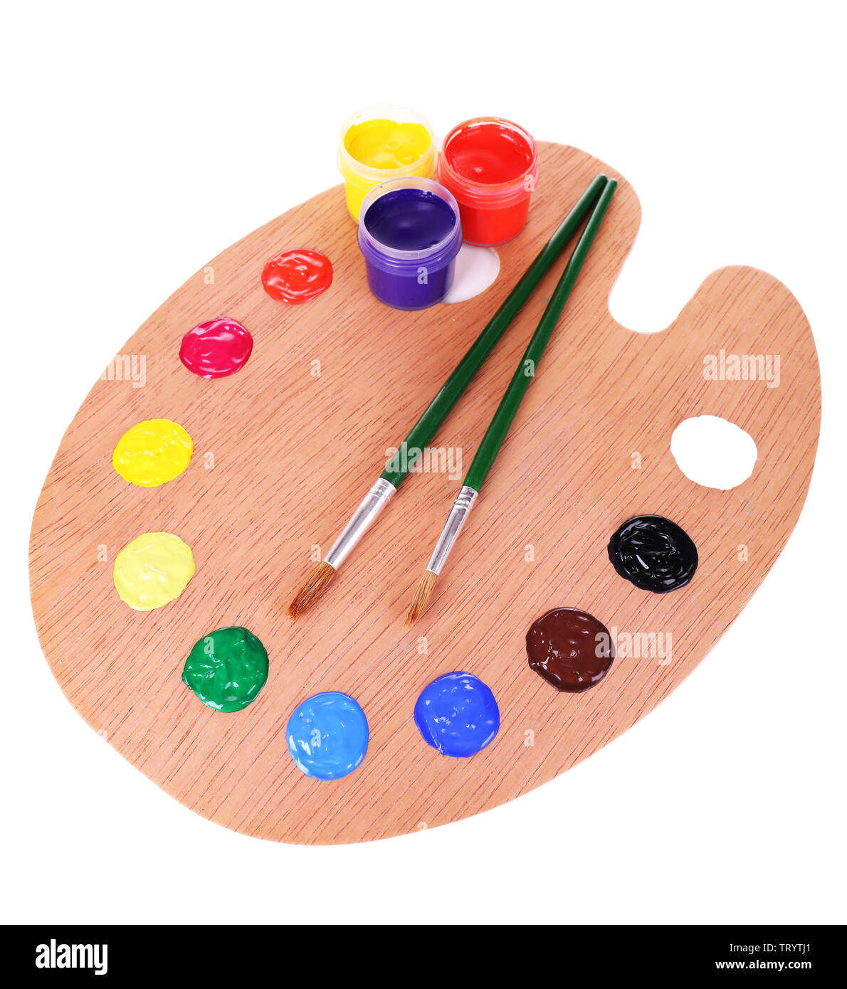 Wooden art palette with paint and brushes isolated on white Stock Photo ...