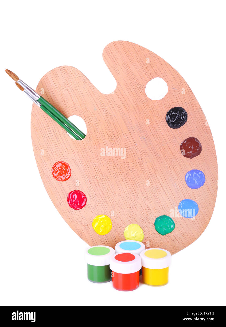 Wooden art palette with paint and brushes isolated on white Stock Photo ...